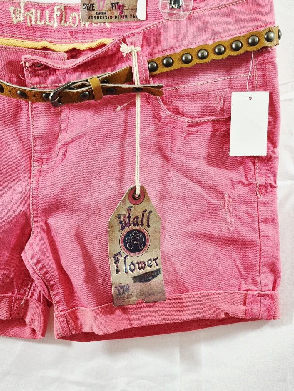 Wallflower Pink Siesta Distressed Low Rise Denim Shorts with Studded Tan Belt